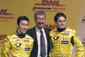  Eddie Jordan with 2002 drivers, Takuma Sato (left) and Giancarlo Fisichella. Photo: LAT Photographic