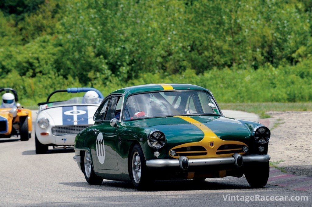 During Saturday qualifying, Bob Wismer’s Toronado Talisman leads Jeff Freers’ Sprite out of Turn 3.<br /> Photo: Jim Hatfield