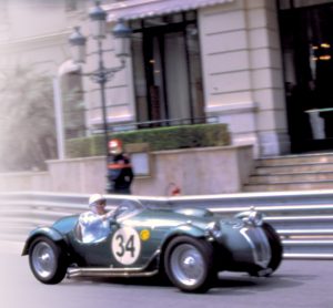 Stirling Moss at the wheel of a Frazer NashPhoto: Peter Collins