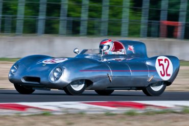 Group 1.  Ed Nigro (#52, 1956 Lotus Eleven) entering turn 12 during Saturday morning's qualifying race. Jeff Mach