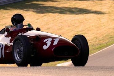 Peter Giddings' silhouette under the turn 12 bridge. 1953 Maserati 250F. DennisGray