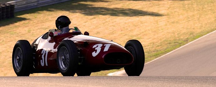 Peter Giddings' silhouette under the turn 12 bridge. 1953 Maserati 250F. DennisGray