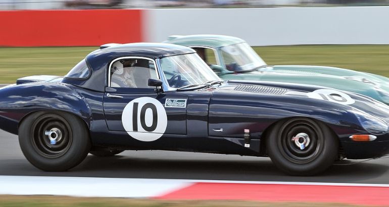 Pair of Jaguar E-Types are neck and neck TIM SCOTT