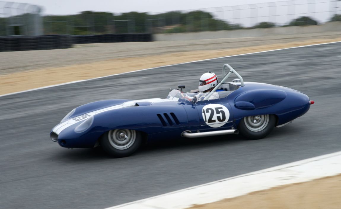 Erickson Shirley's 1959 Lister Costin Chevrolet enters The Corkscrew. DennisGray