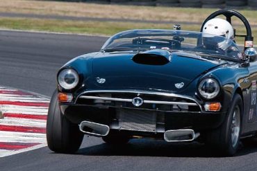 Mark Sorsdahl's 1964 Sunbeam Tiger powering through Turn 12