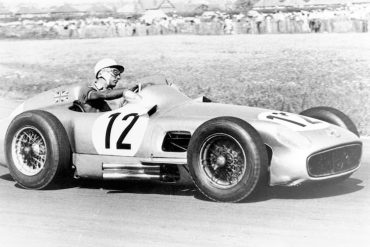 British Grand Prix in Aintree, July 16, 1955. Winner Stirling Moss (start number 12) racing at the wheel of his Mercedes-Benz W 196 R monoposto.