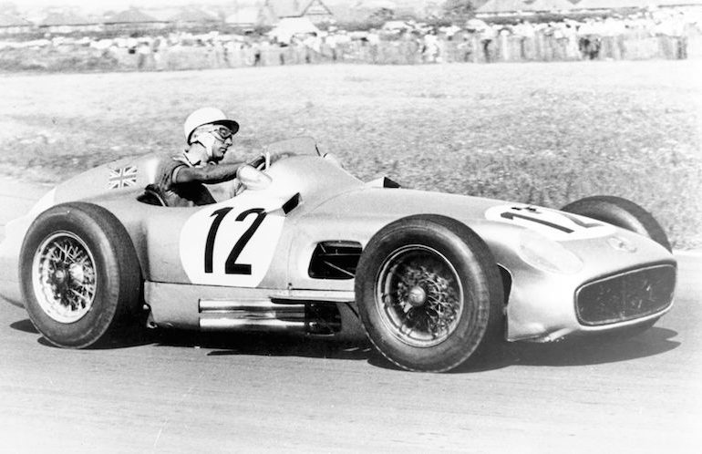 British Grand Prix in Aintree, July 16, 1955. Winner Stirling Moss (start number 12) racing at the wheel of his Mercedes-Benz W 196 R monoposto.