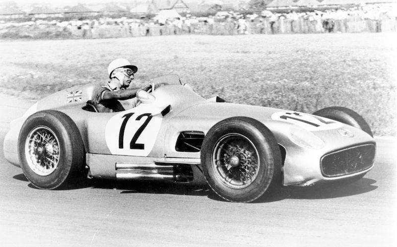 British Grand Prix in Aintree, July 16, 1955. Winner Stirling Moss (start number 12) racing at the wheel of his Mercedes-Benz W 196 R monoposto.