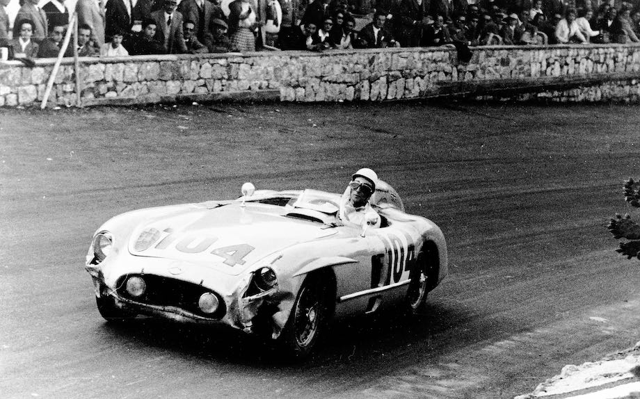 Stirling Moss in Mercedes-Benz 300 SLR with starting number 104. Mercedes-Benz's winning team: Stirling Moss/Peter Collins.