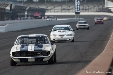 Camaro, Mustang, Camaro and Mustang head for turn one Peter Falkner