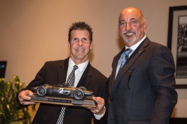 Bobby Rahal (r) presents Scott Pruett with the RRDC Phil Hill award for 2016