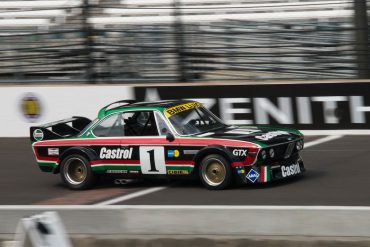 Steve Walker - 1973 BMW CSL crosses the Bricks first winning his group. DennisGray