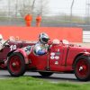 Richard Bradley's Aston Martin Ulster partly obscures John Briggs similar car.