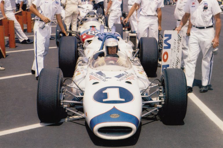 Mario Andretti drives the Brawner/Hawk to victory in Phoenix, Arizona (1966).