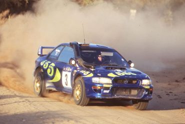 Colin McRae in the Subaru Impreza Group A rally car built by Prodrive