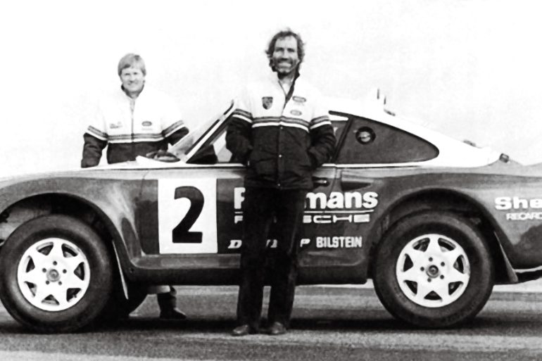 Team of Porsche 959s finish 1st, 2nd and 6th in the Paris-Dakar Rally (1986).