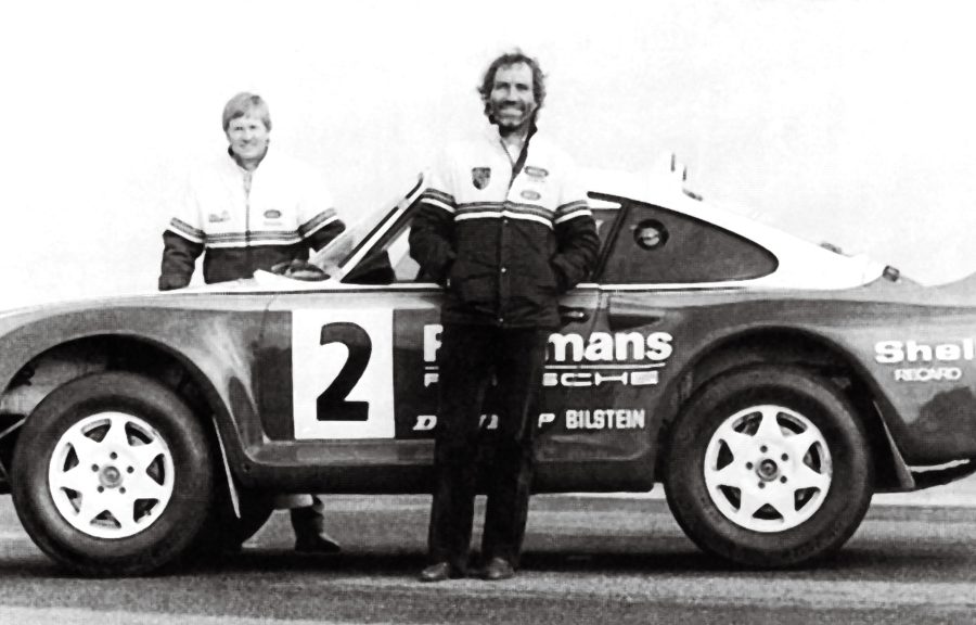 Team of Porsche 959s finish 1st, 2nd and 6th in the Paris-Dakar Rally (1986).