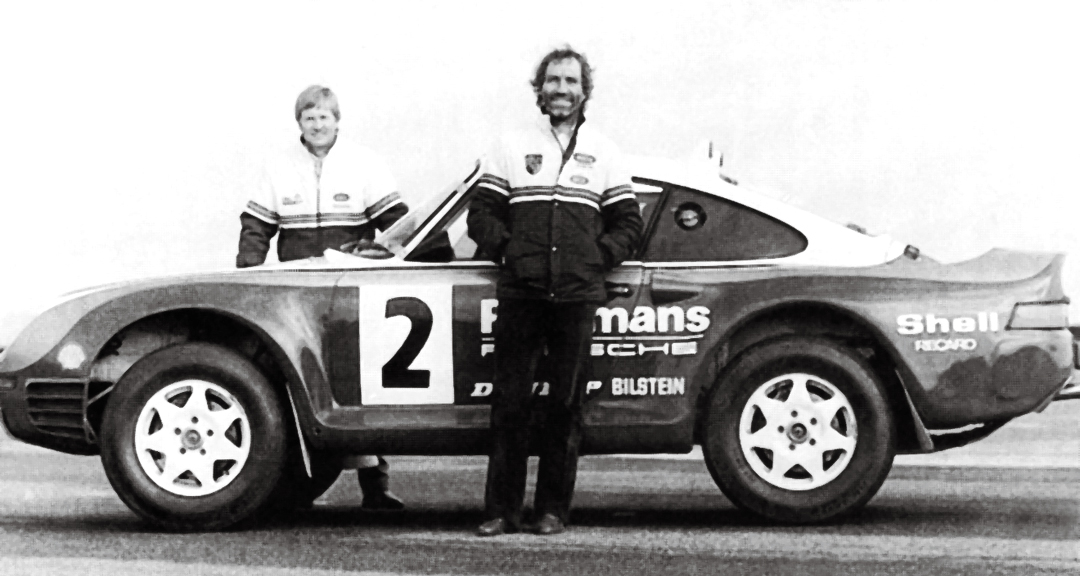 Team of Porsche 959s finish 1st, 2nd and 6th in the Paris-Dakar Rally (1986).