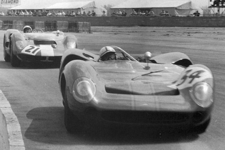 The Lola T70 spyder makes its race debut at Silverstone, England (1965).