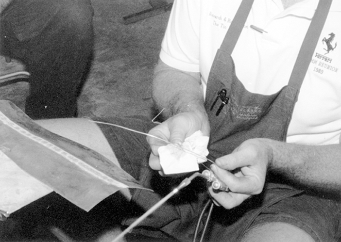 White cleans the filler wire prior to welding.
Photo: Harold Pace