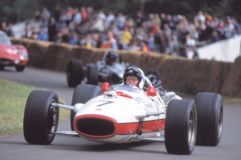 John Surtees and the 1966 Honda RA273 Formula One car.
Photo: Peter Collins