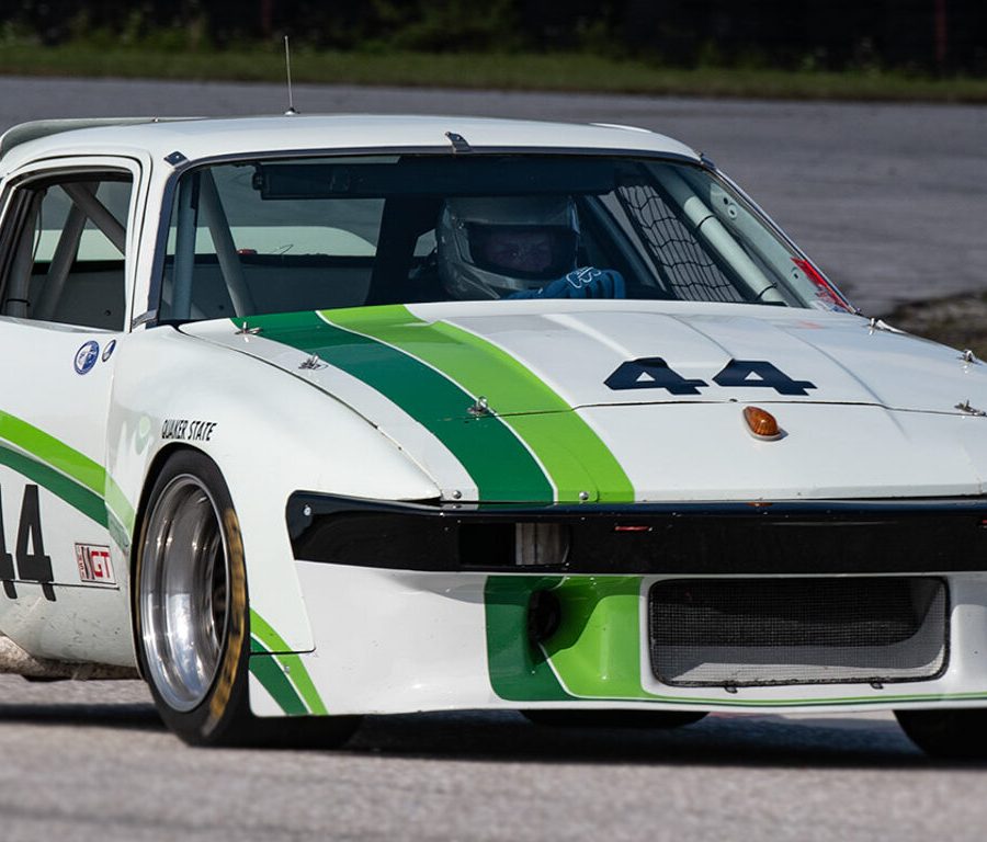 Bill Warner in an X Group 44 Triumph TR8 Chuck Andersen