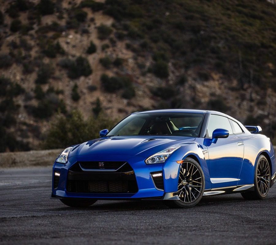 Blue Nissan GT-R R35 on road