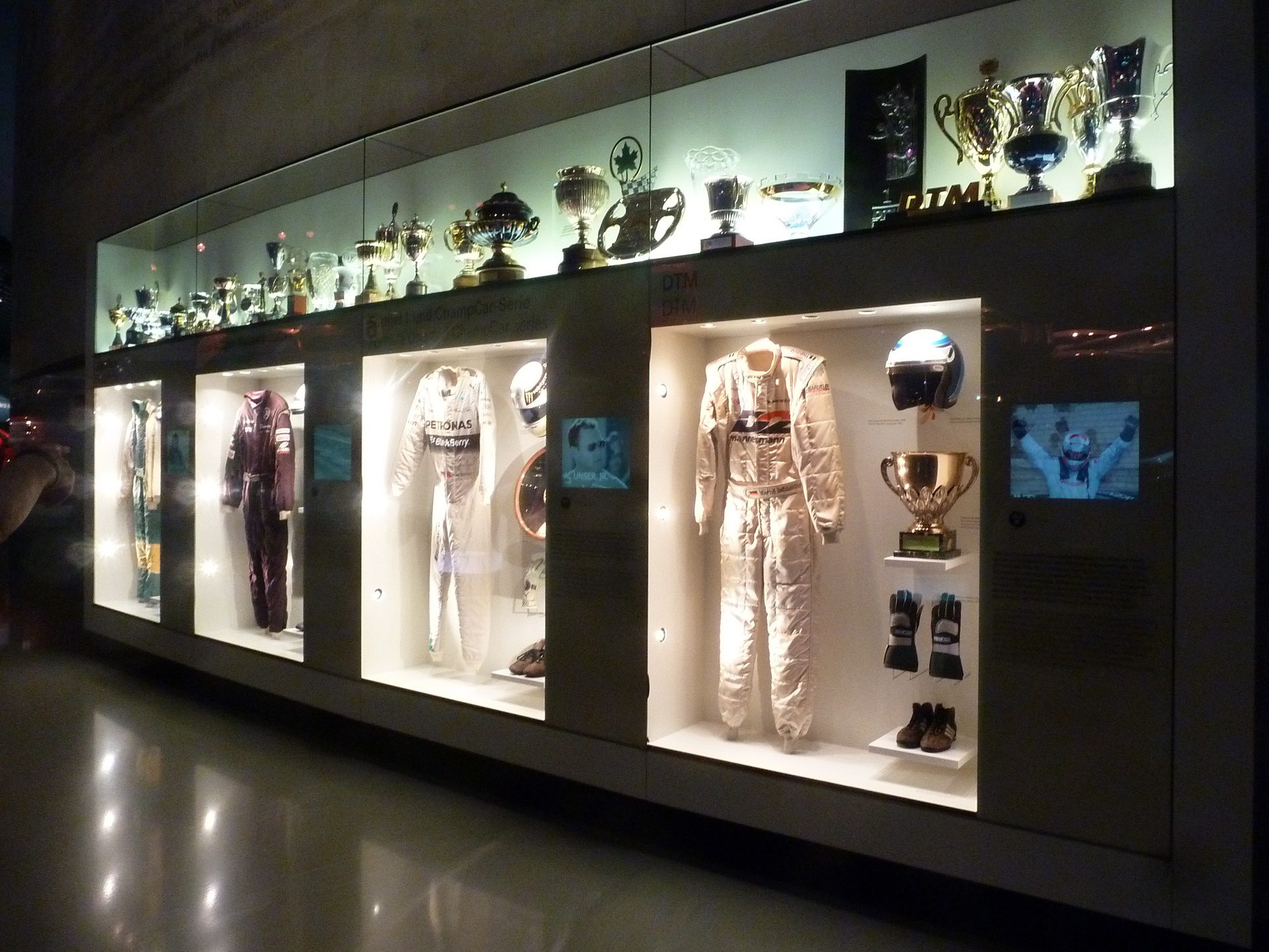 Display of racing apparel at Mercedes-Benz museum in Germany