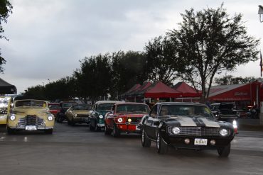 A whole bunch of Ford Mustangs