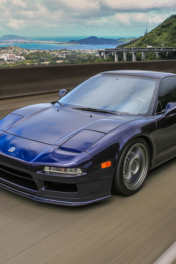 1st gen blue Acura NSX cruising