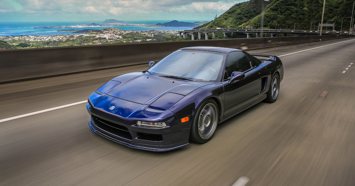 1st gen blue Acura NSX cruising