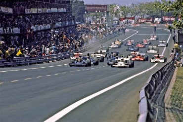 Start of the Grand Prix with the temporary pits and grandstands groaning under the weight of spectators.